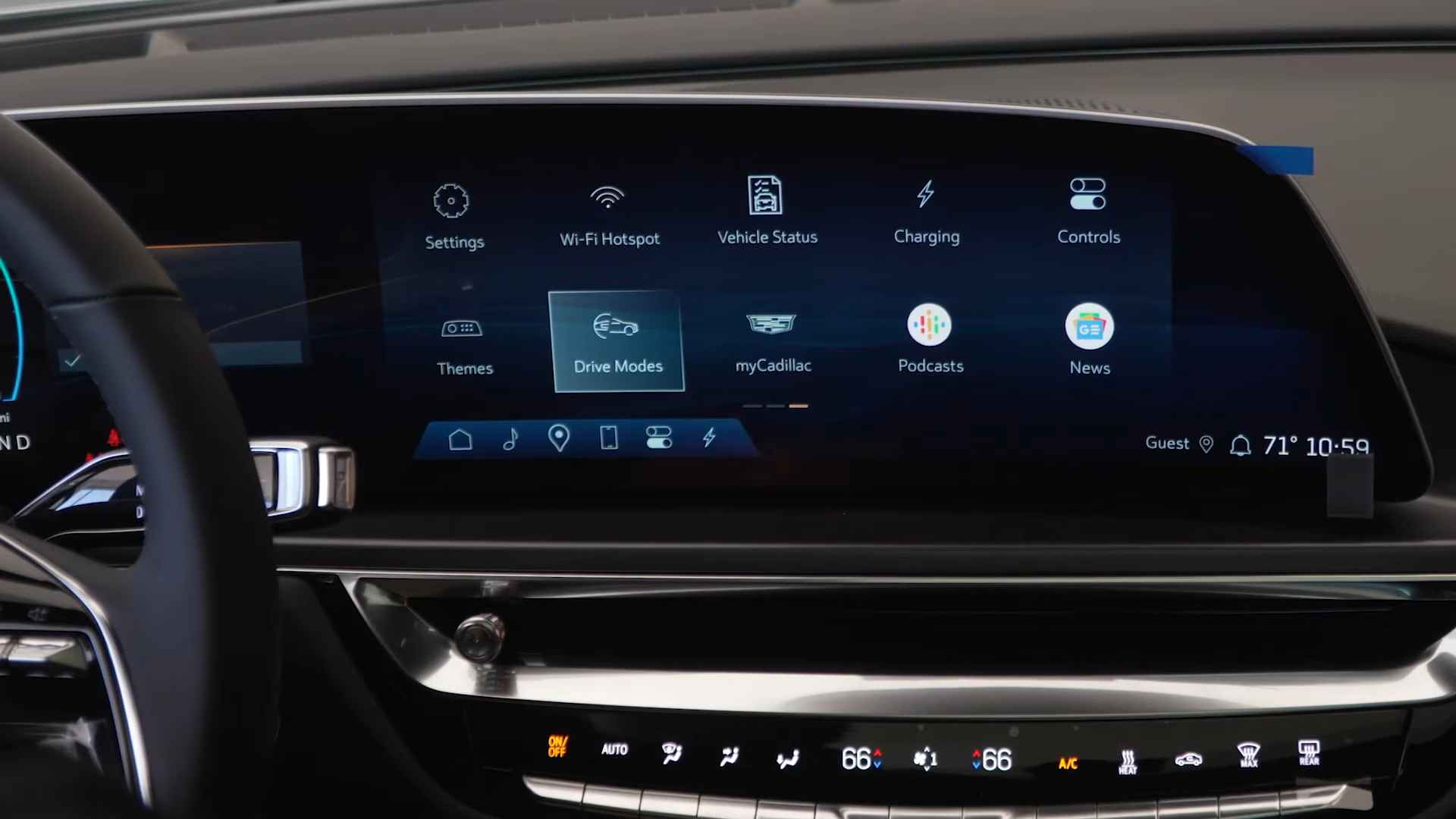 Cadillac Lyriq infotainment screen showing the Drive Modes menu alongside settings, charging, and vehicle status options. Fact for caption While driving modes in the Cadillac Lyriq do not change the battery’s total capacity, they alter throttle mapping, regenerative braking behavior, and power delivery. More performance-focused settings typically use energy faster, while balanced modes like Tour help optimize overall efficiency and range.