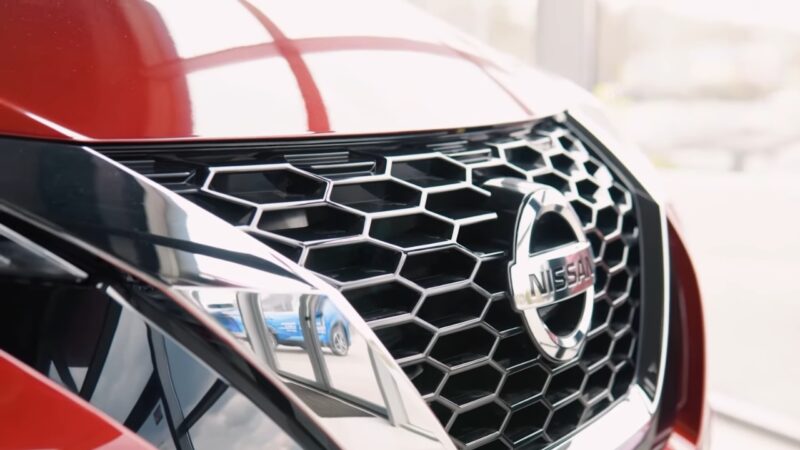 Front grille and Nissan badge on a 2019 Altima highlighting its design in reliability discussions