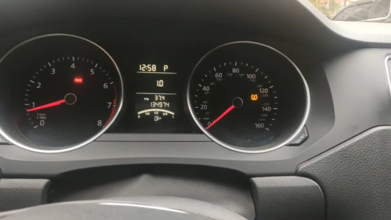 Dashboard showing TPMS warning light indicating low tire pressure